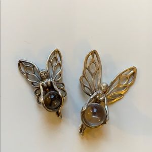Two Silver fairy pendants with quartz balls